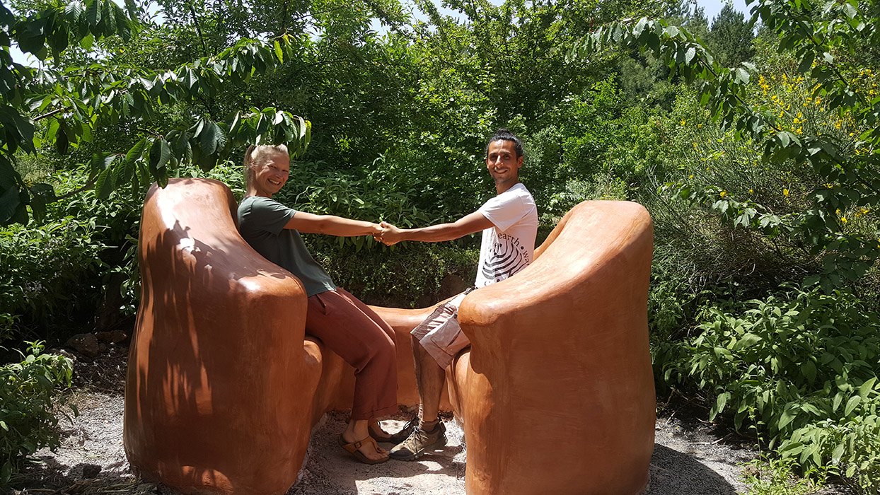 superadobe earthbag garden bench plastered with cocciopesto