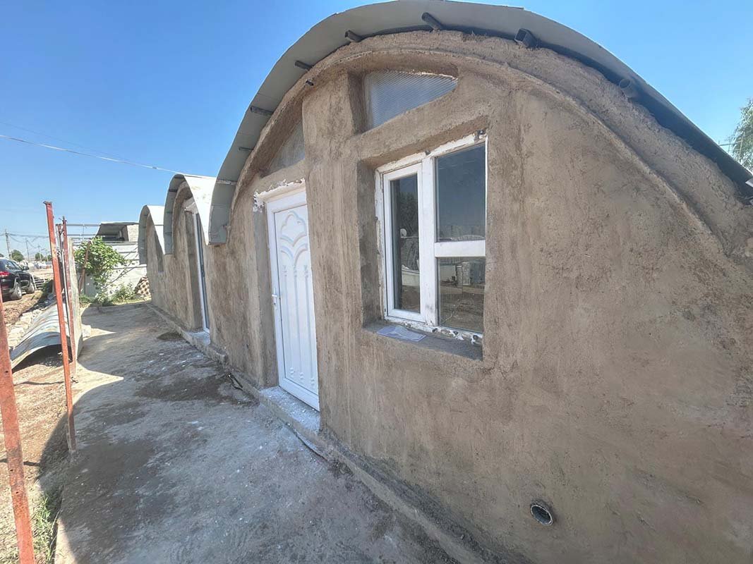 superadobe earth vault in refugee camp